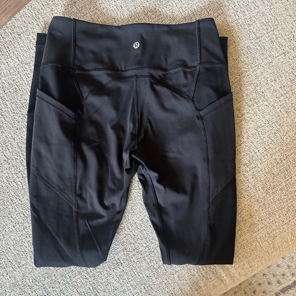 Lululemon black leggings with pockets size 8